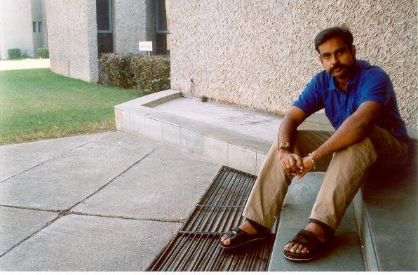 Jawed sitting on the steps of the IRMA mess